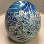 Silvery Moon, the title of this etched Ostrich Egg iruns around the edge